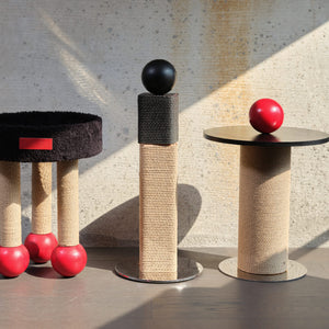 Minimalist Mid-Century scratching post in living room with modern decor.