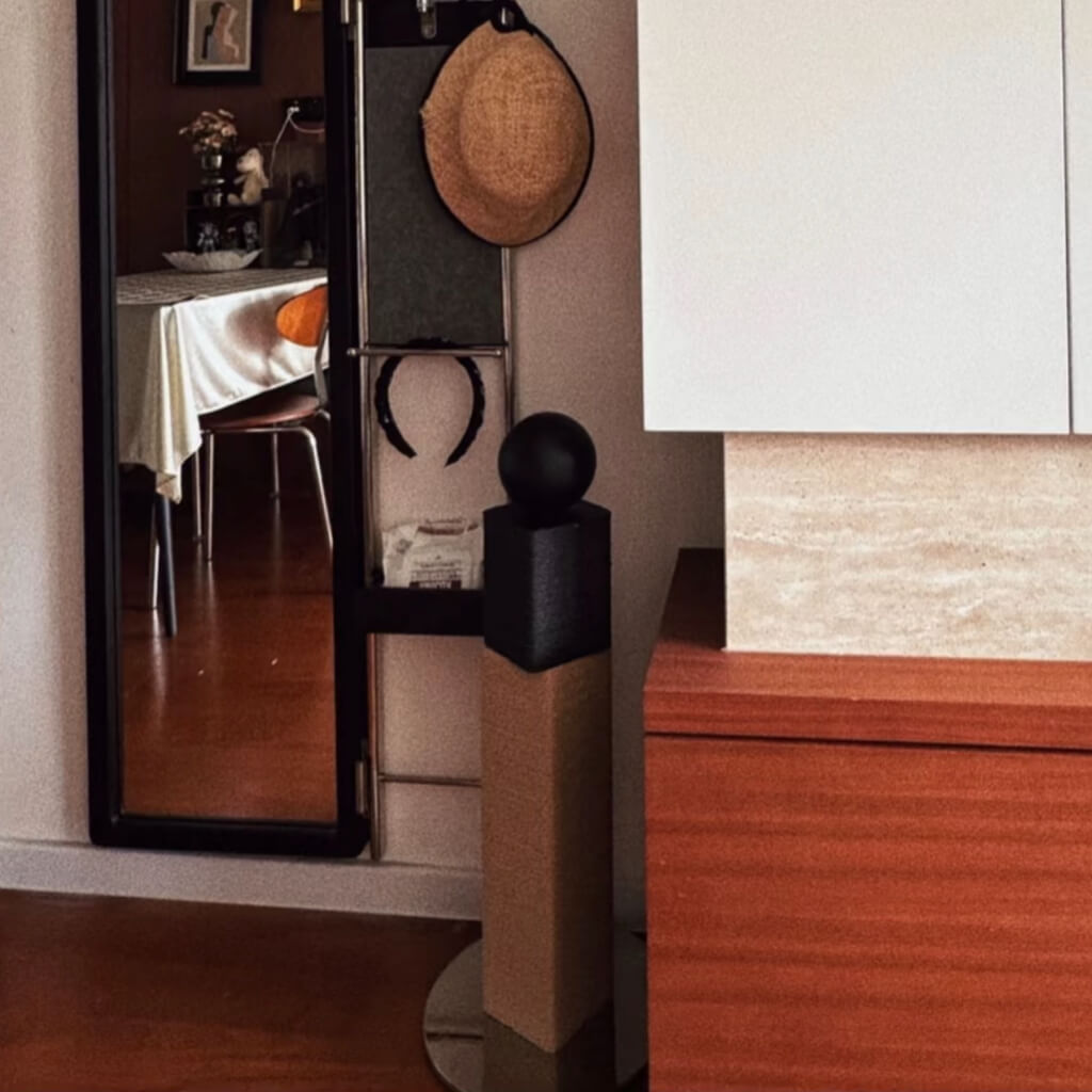 Functional art piece, Mid-Century Modern Matchstick Cat Scratching Post in stylish living space.