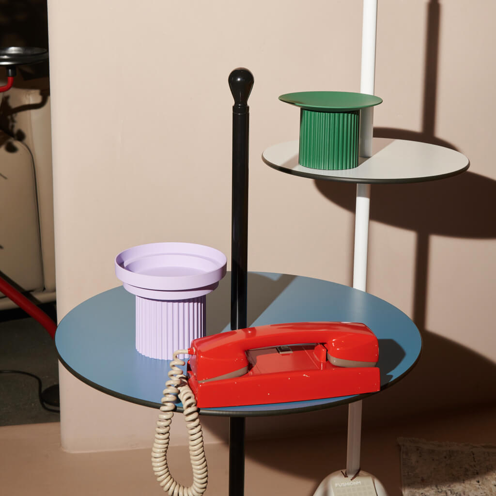 Display of Purrre Moss Green Teeth Party Pet Bowl alongside a Purple version on a shelf.