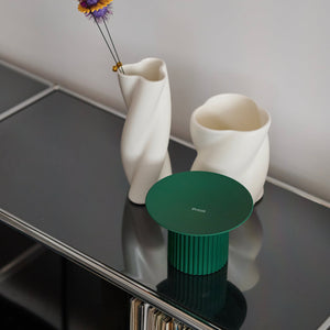 Minimalist shot of Purrre Moss Green Teeth Party Pet Bowl on a modern interior table.