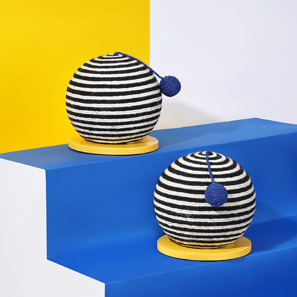 Two ZEZE Memphis Striped Sisal Cat Scratch Balls with yellow wooden bases, displayed against a bright background for a modern look.