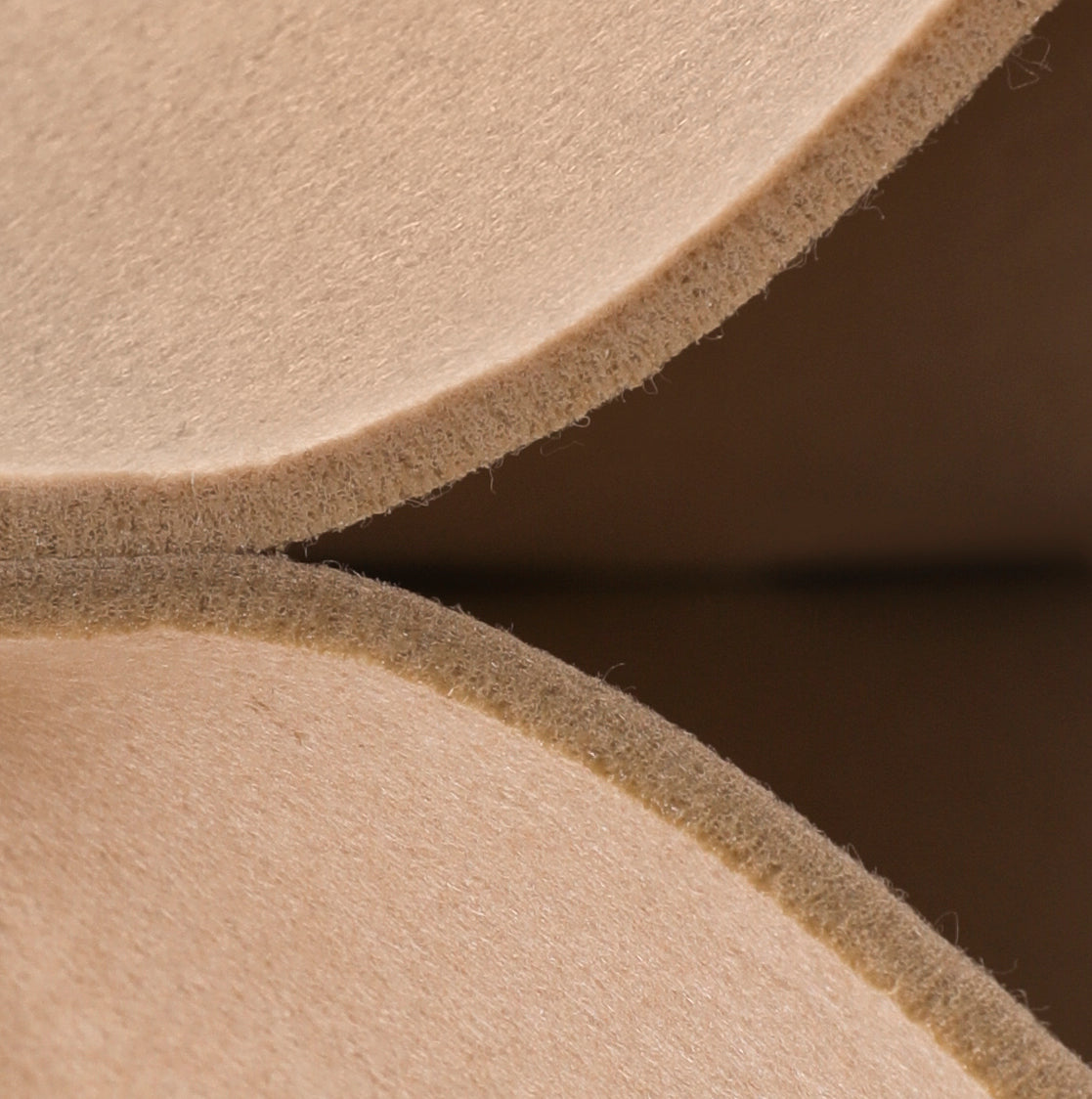 Close-up of the layered felt material used in the Smelling Felt Cat Bed, showcasing the soft texture and durable build.